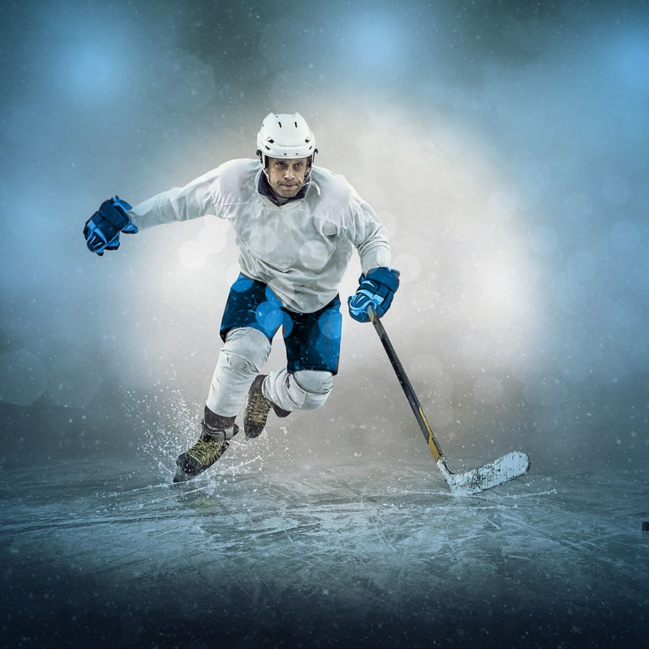 Ice hockey player on the ice, outdoors